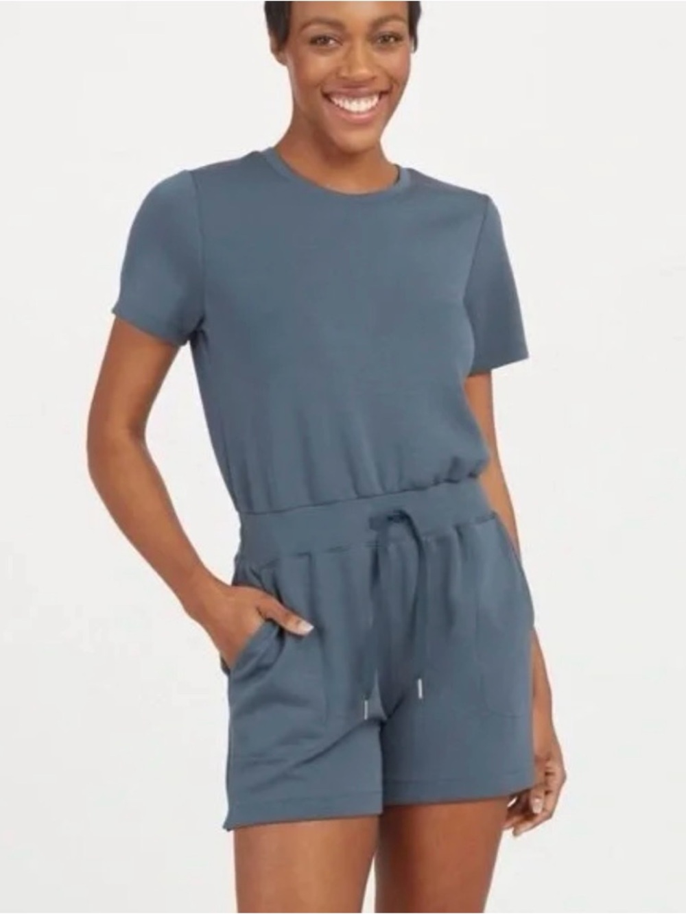 SPANX air essentials short sleeve romper in storm blue M